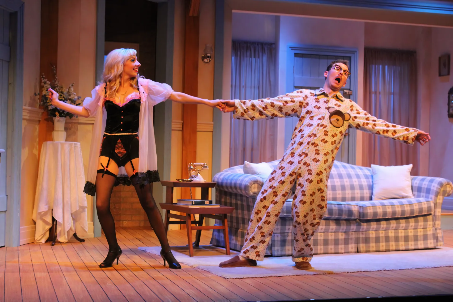 Production image from Don't Dress for Dinner emphasizing layered depth and door placement for farce, scenic design by Brandon PT Davis.