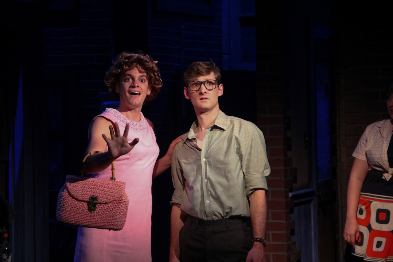 Production still from Little Shop of Horrors highlighting the grounded storefront realism, scenic design by Brandon PT Davis.