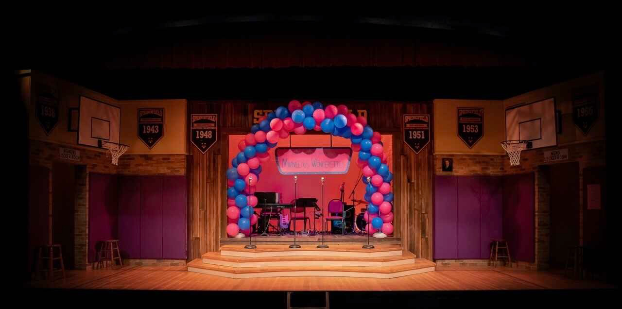 Final production image from The Marvelous Wonderettes: Dream On showing the complete reunion environment, scenic design by Brandon PT Davis.