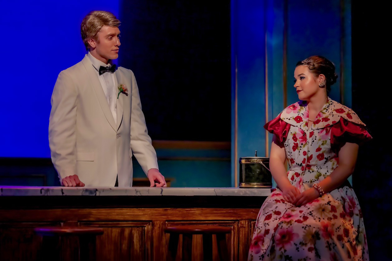 Production still emphasizing the integrated band and room layout in Cole, scenic design by Brandon PT Davis.