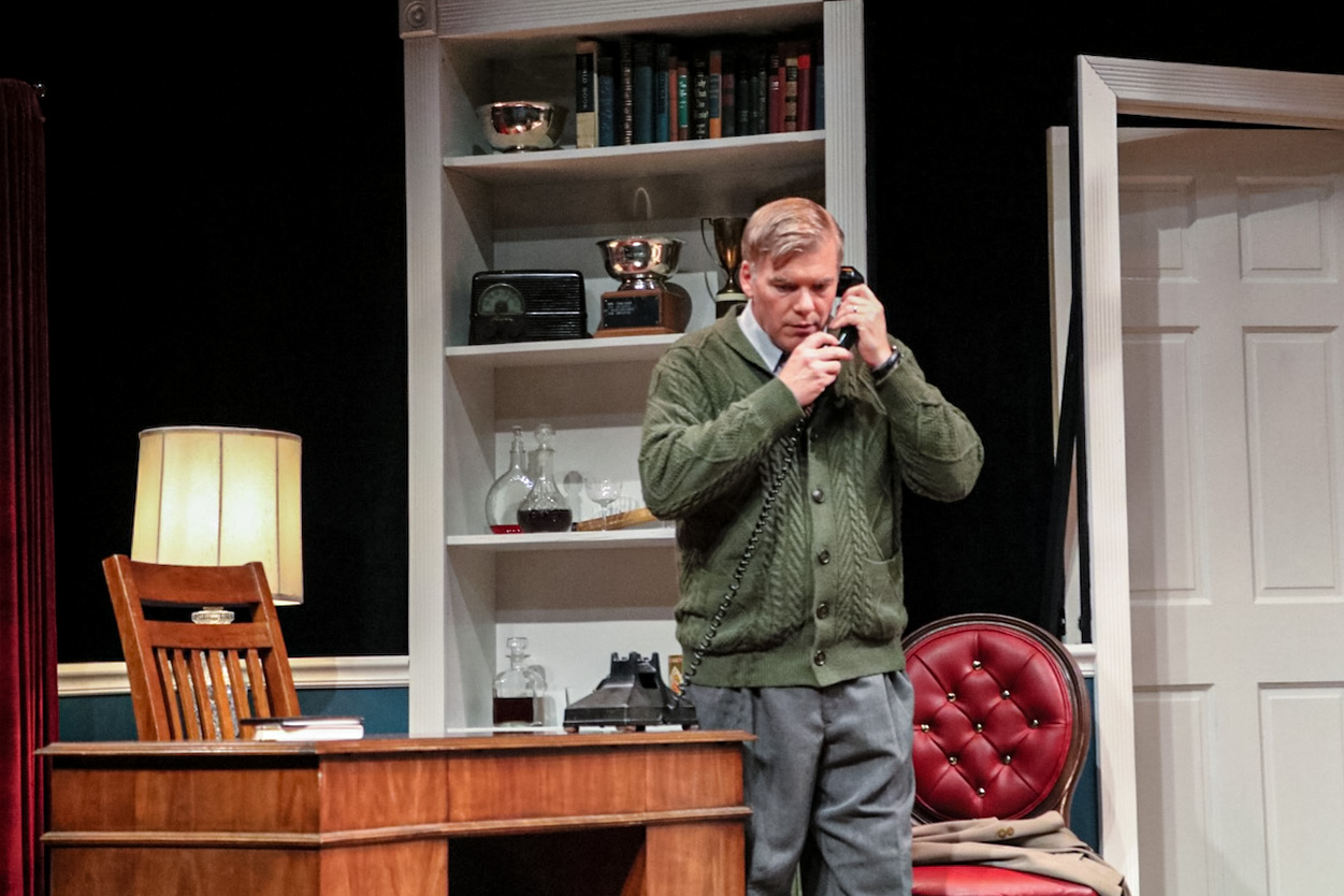 Scene from Dial M for Murder framed by the apartment architecture, scenic design by Brandon PT Davis.