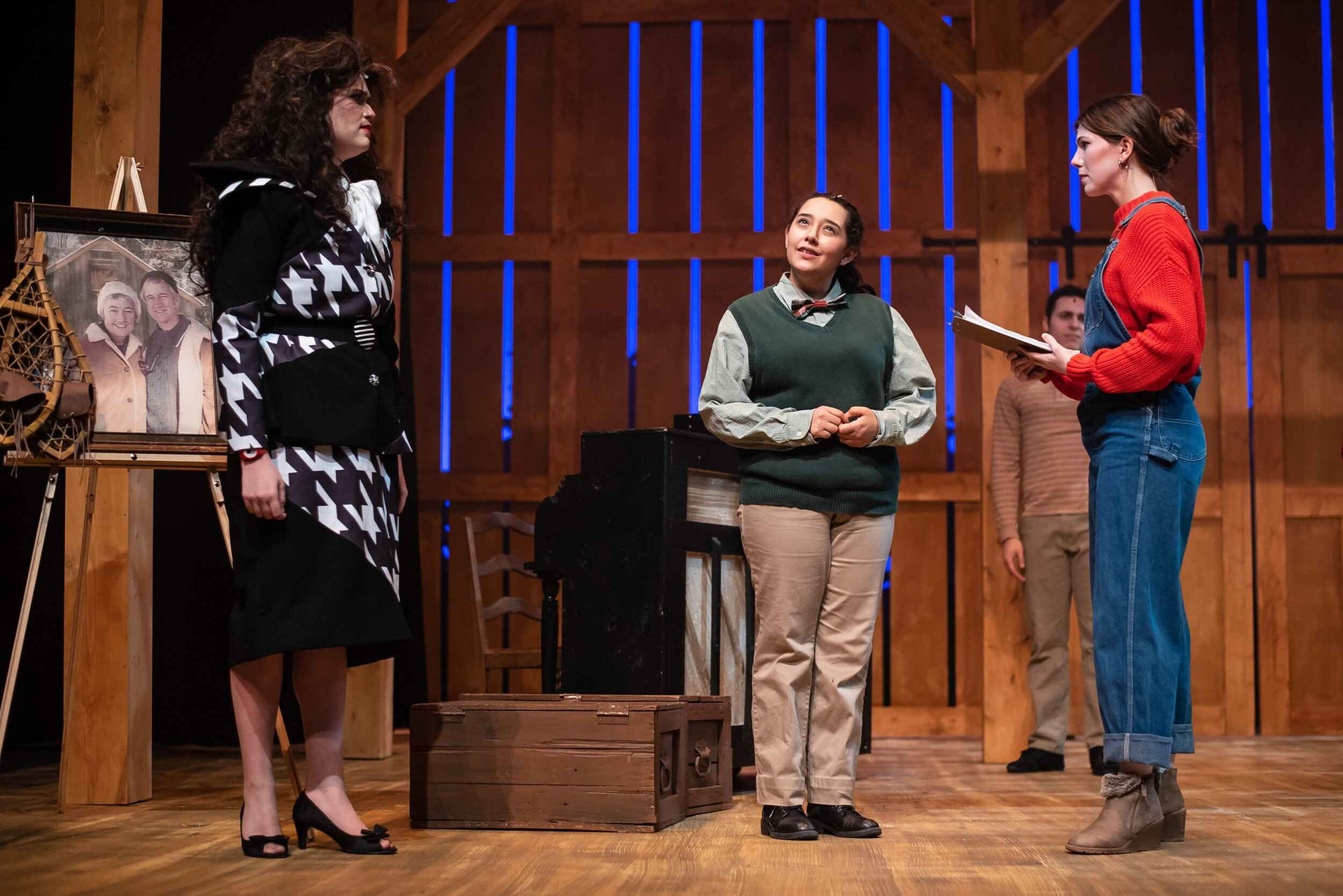 Production image from A Smalltowne Christmas showing the festive scenic environment, scenic design by Brandon PT Davis.
