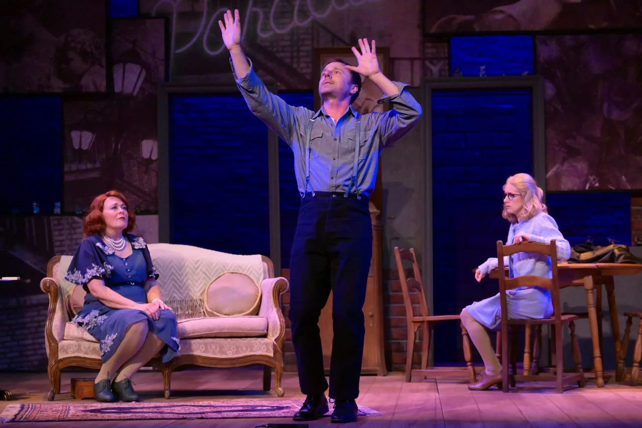 Ensemble stage picture inside the poetic world of The Glass Menagerie, scenic design by Brandon PT Davis.