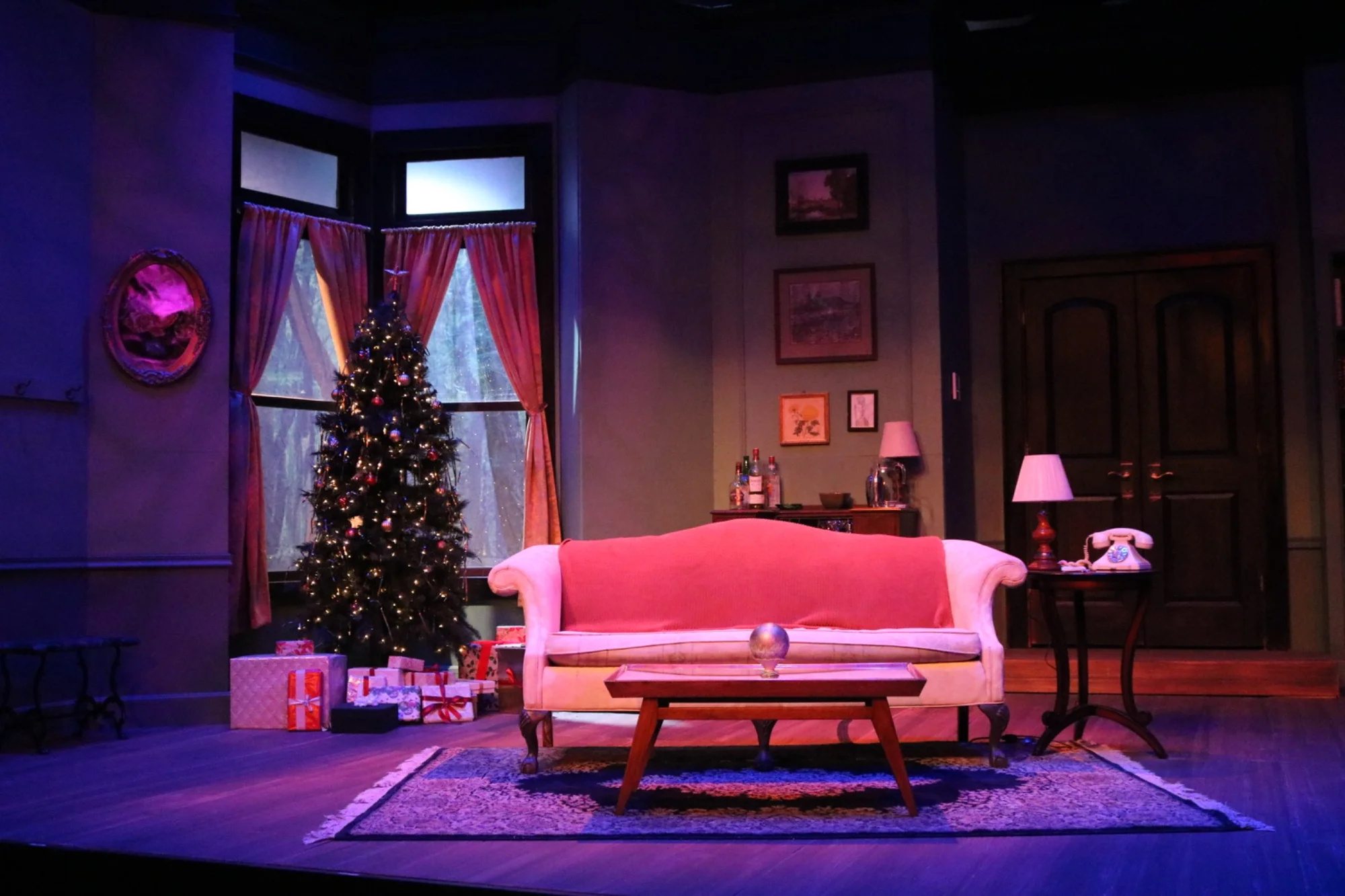 Production image from Bell, Book, and Candle at Okoboji Summer Theatre, scenic design by Brandon PT Davis.