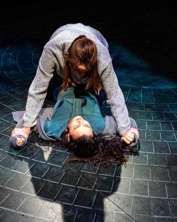 Production still from Parliament Square emphasizing concrete textures and political isolation, scenic design by Brandon PT Davis.