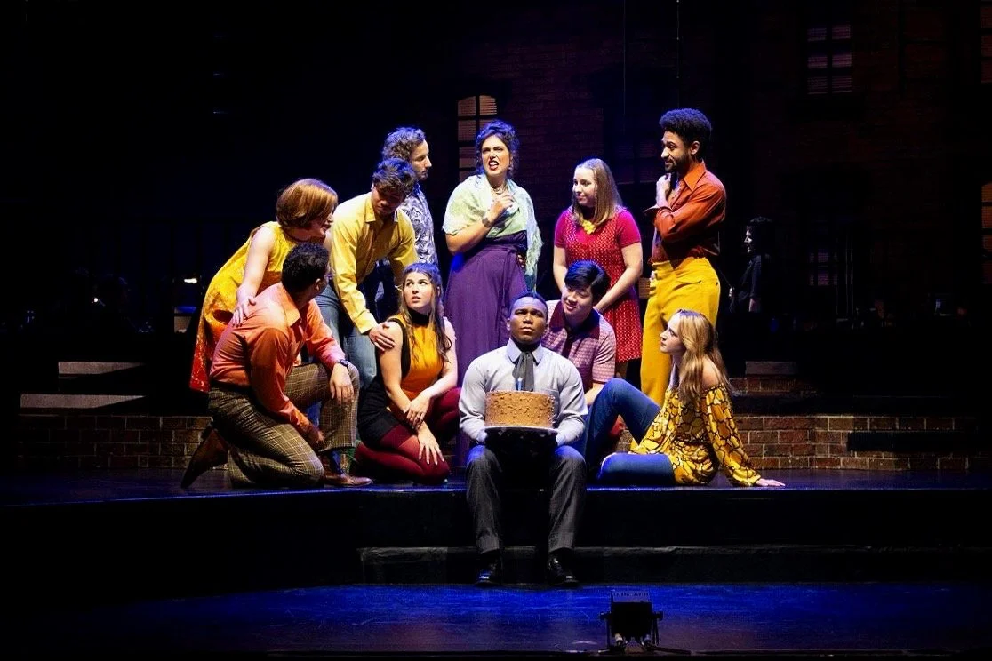 Production still from Company emphasizing architectural contrast and stage movement, scenic design by Brandon PT Davis.