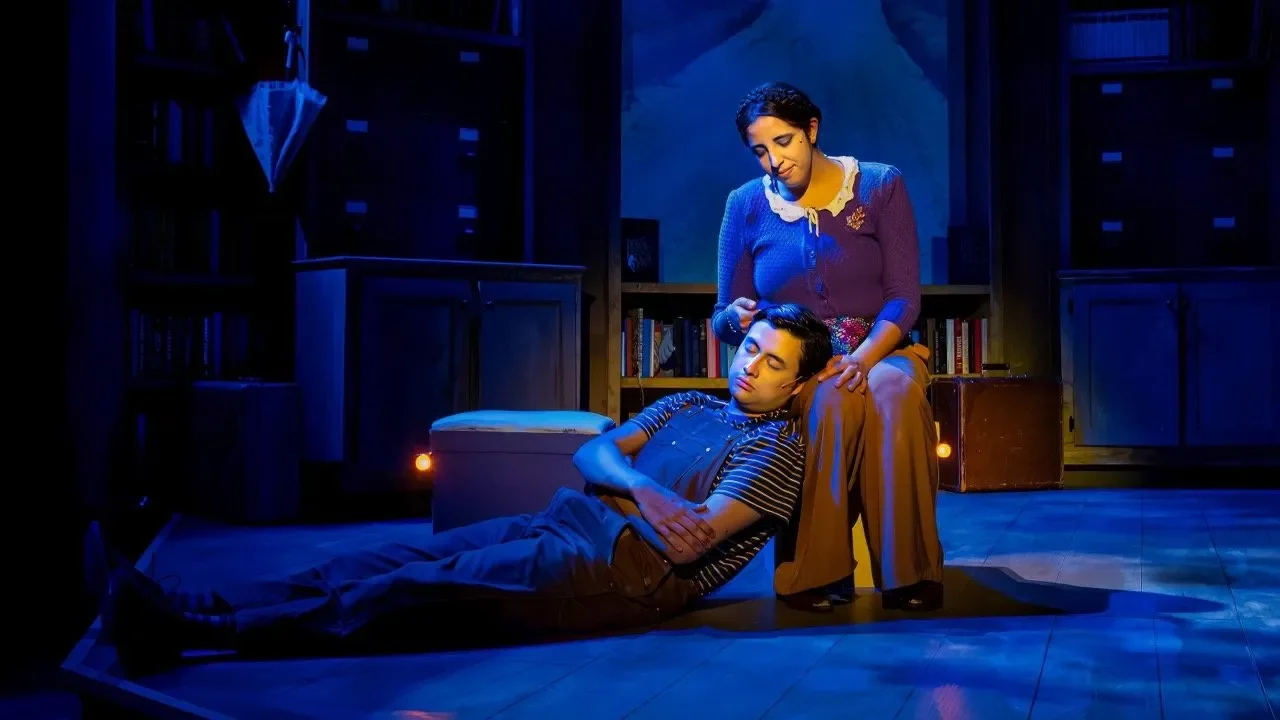 Stage image from Tomás and the Library Lady showing the library motifs within the scenic design, scenic design by Brandon PT Davis.