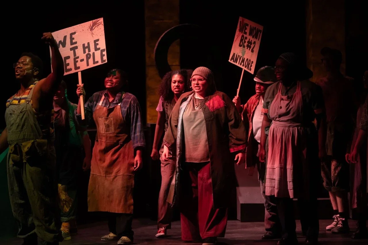 Final production angle showing the complete Urinetown scenic composition, scenic design by Brandon PT Davis.