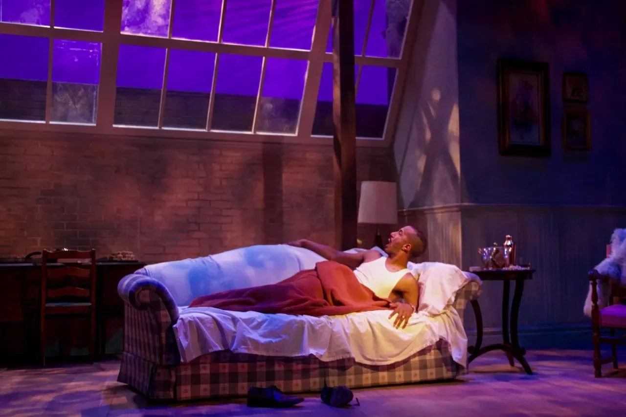 Barefoot in the Park production image with actors framed by the compact set, scenic design by Brandon PT Davis.