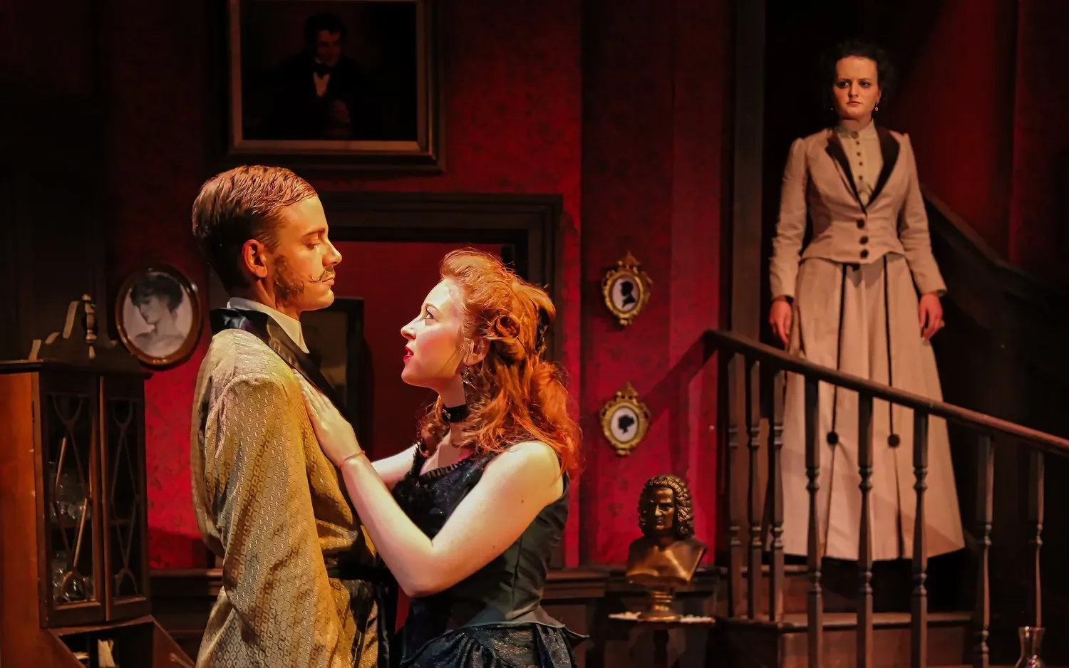 Production image from Angel Street emphasizing domestic control and observation in the drawing room, scenic design by Brandon PT Davis.