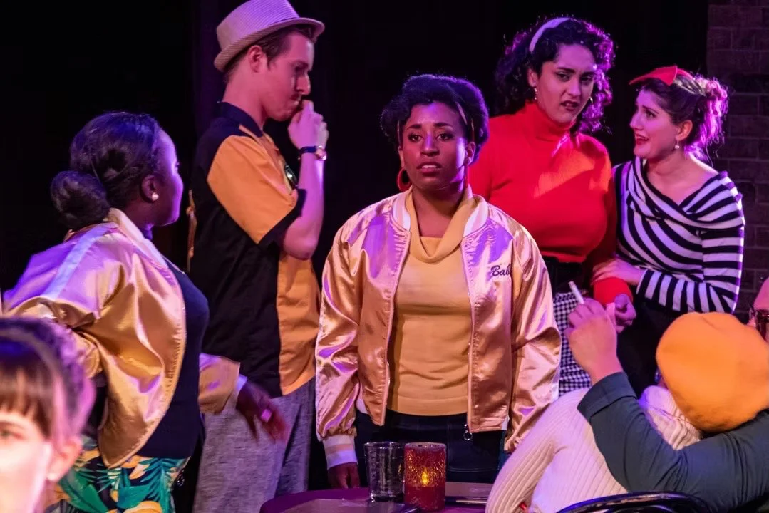 Production image from The Pajama Game showing the Sleep-Tite factory world and ensemble staging, scenic design by Brandon PT Davis.