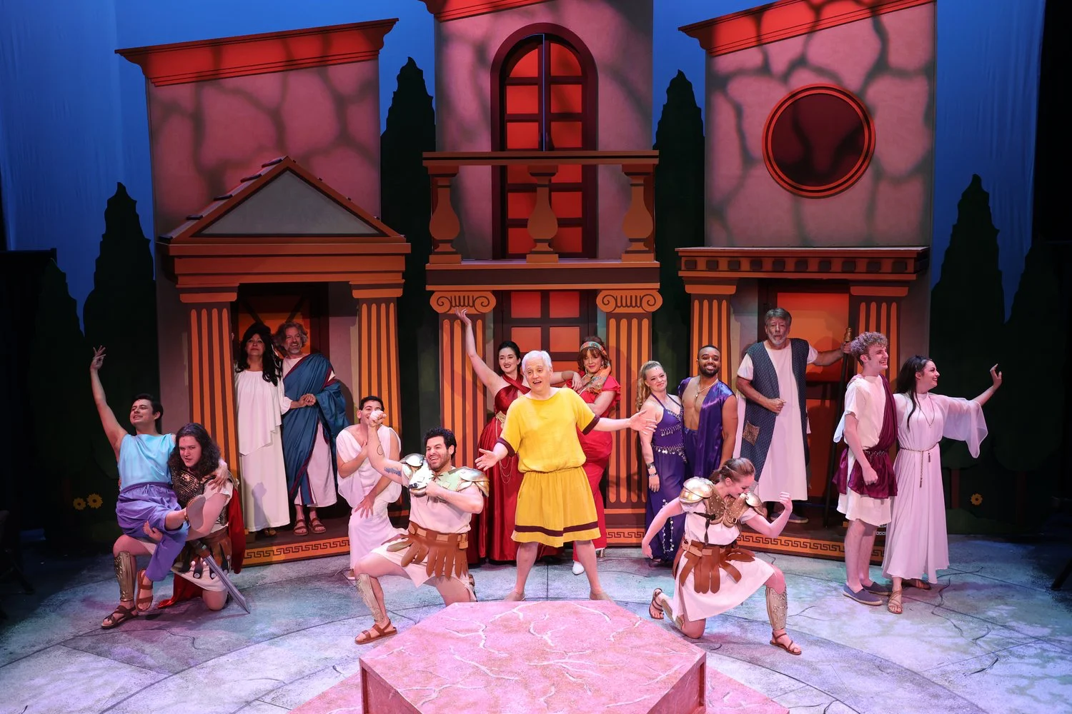 Production image from Forum showing the trio of Roman house façades, scenic design by Brandon PT Davis.