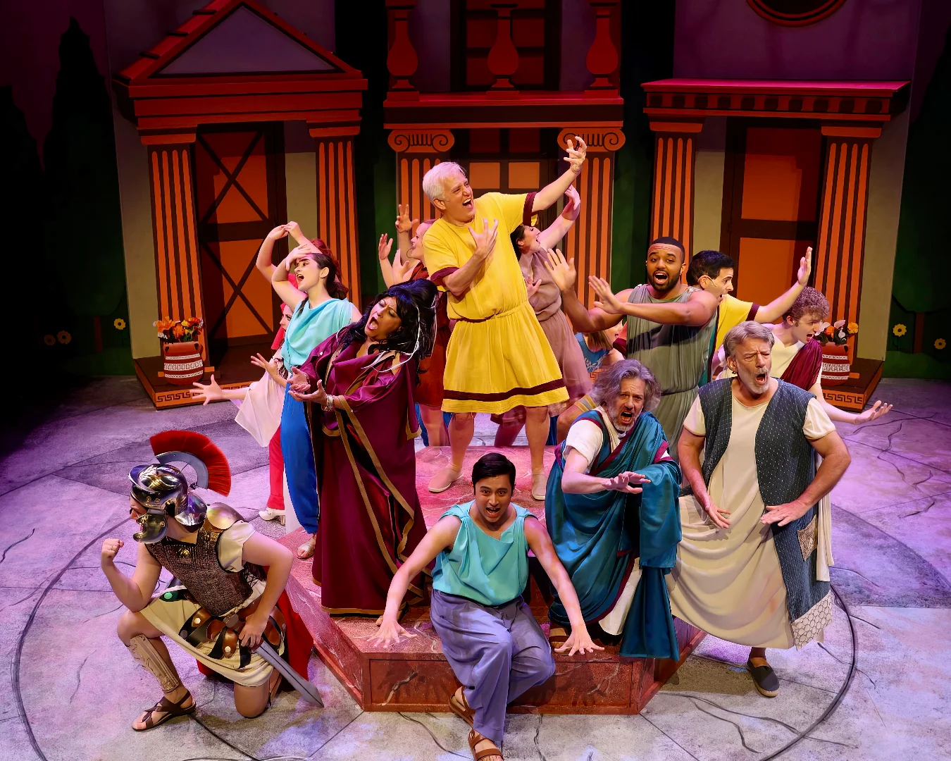 Final production image from Forum showing the full scenic environment and comic staging, scenic design by Brandon PT Davis.