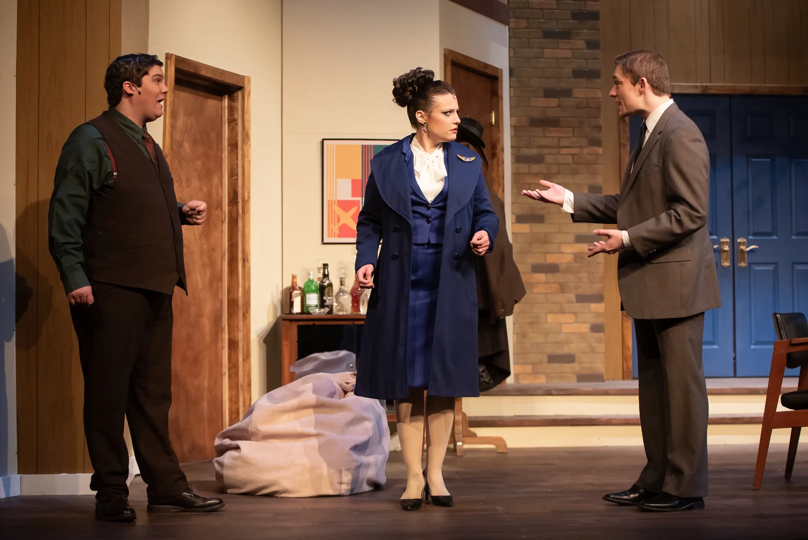 Production image from Boeing, Boeing showing the midcentury apartment interior, scenic design by Brandon PT Davis.