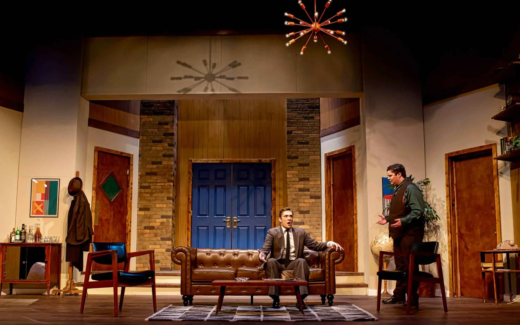 Production image from Boeing, Boeing with the apartment's furniture and graphic detail visible, scenic design by Brandon PT Davis.