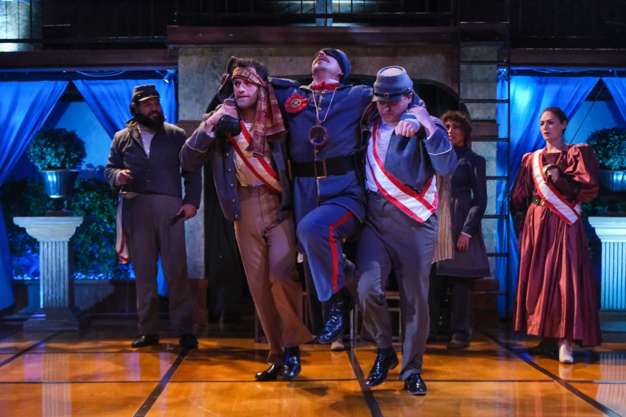 Performance image from All's Well That Ends Well with actor pathways visible, scenic design by Brandon PT Davis.