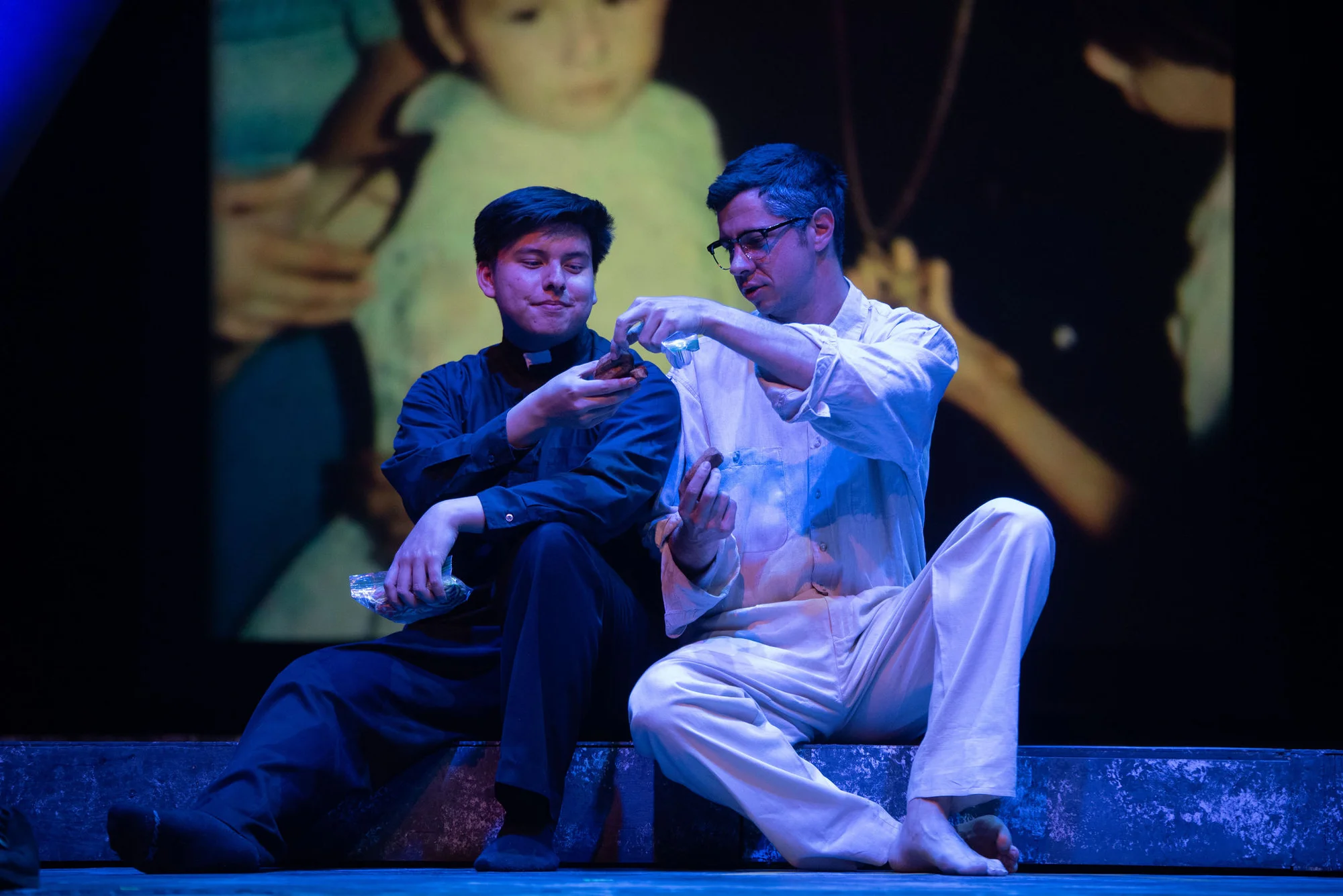 Lighting and scenic texture interplay in a dramatic scene from Romero, scenic design by Brandon PT Davis.