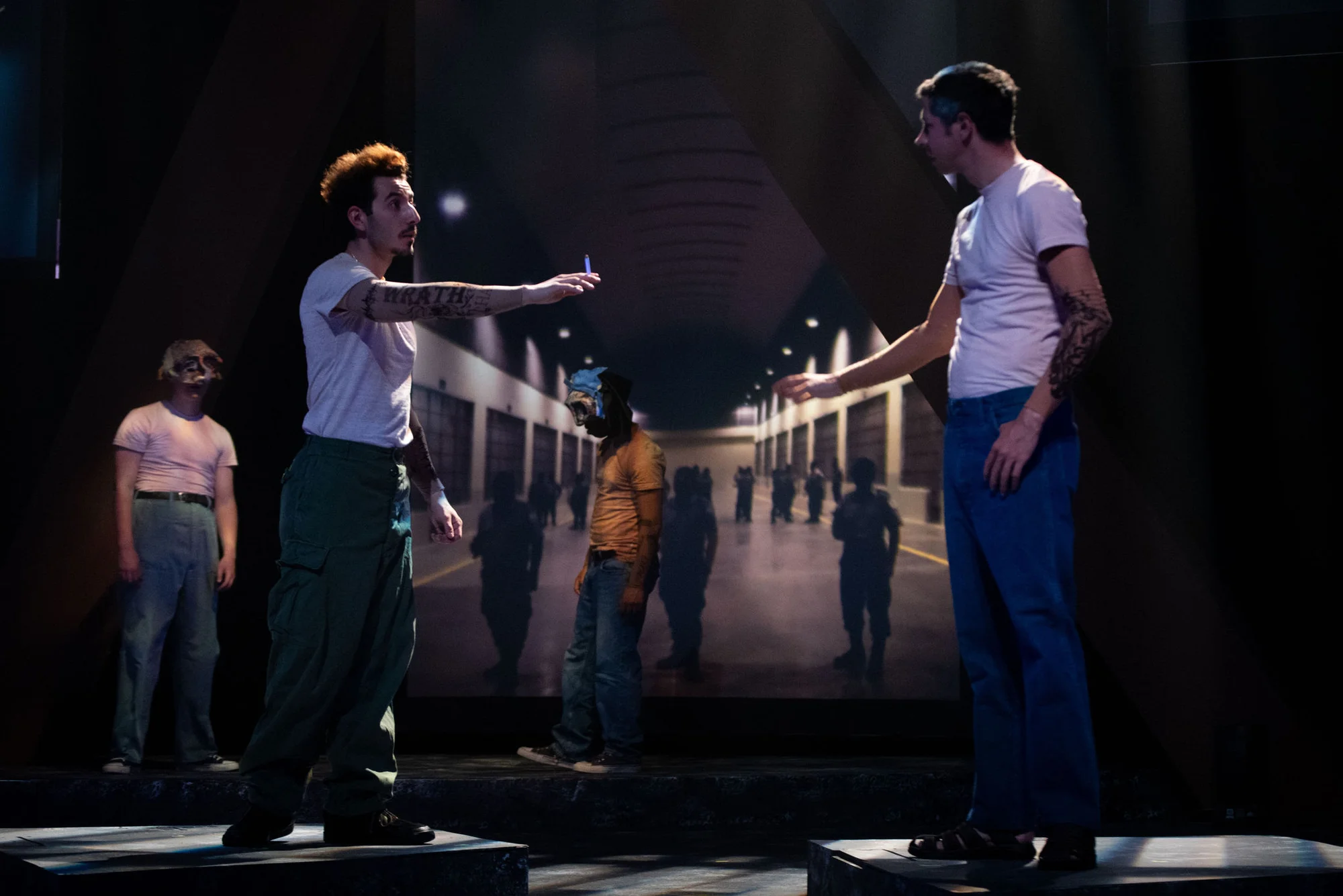 Scene transition across the central platform system in Romero at University of Missouri, scenic design by Brandon PT Davis.