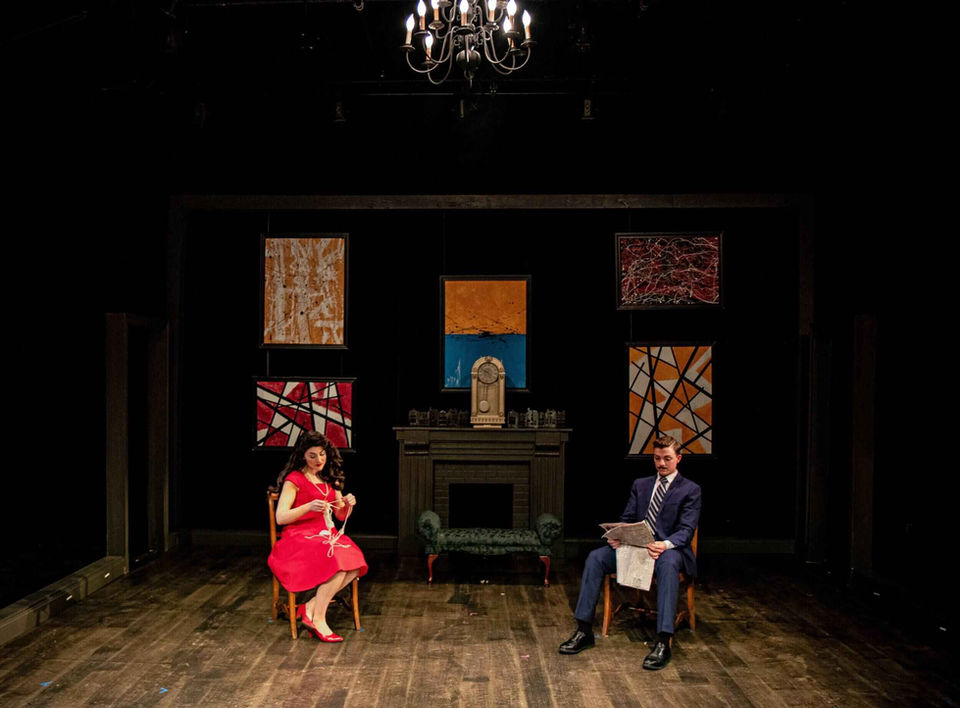 Production still from The Bald Soprano emphasizing the absurd domestic scale and actor framing, scenic and lighting design by Brandon PT Davis.