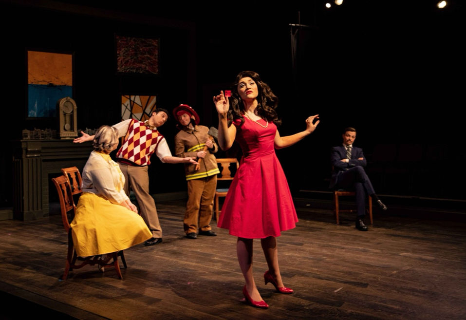 Performance still from The Bald Soprano highlighting warped domestic architecture and comic tension, scenic and lighting design by Brandon PT Davis.