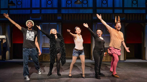 Production still from The Complete Works of William Shakespeare (abridged) highlighting fast-paced theatrical transitions, scenic design by Brandon PT Davis.