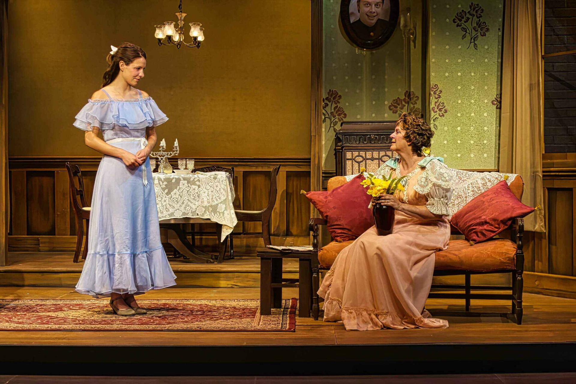 Production image from the 2011 Glass Menagerie showing the domestic memory world, scenic design by Brandon PT Davis.